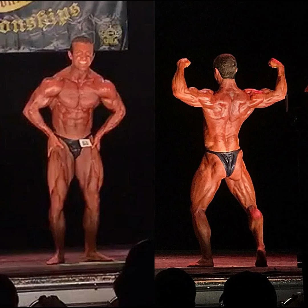 A Cardone Nutrition client competing on stage at a bodybuilding show.